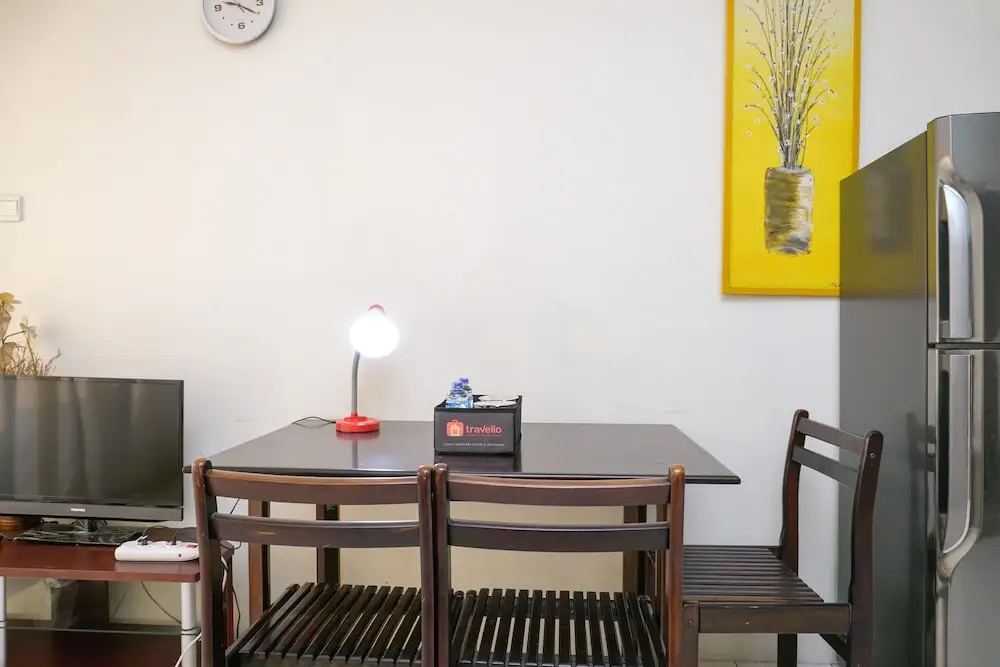 Clean and Homey 1BR at Puri Garden Apartment