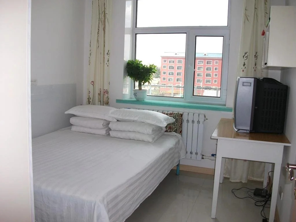 Mengxing Home Inn