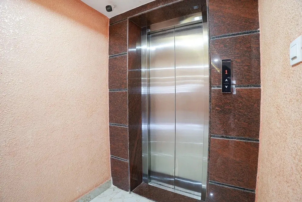 FabHotel A White Pearl Suites - Nr Bangalore Airport