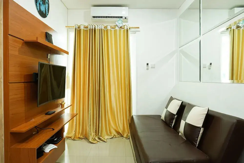 Luxury 2BR at Apartment Woodland Park Residence By Travelio