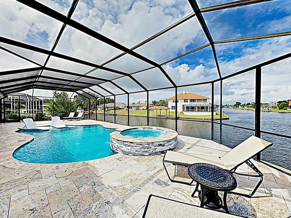Waterfront W/ Stunning Views, Pool, Boat Dock 4 Bedroom Home