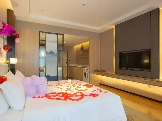 Kuanrong Suites Hotel Liangjiang love sea shopping park