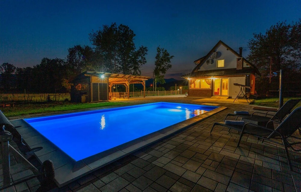 Nice Home in Smiljan With Sauna, Wifi and Outdoor Swimming Pool
