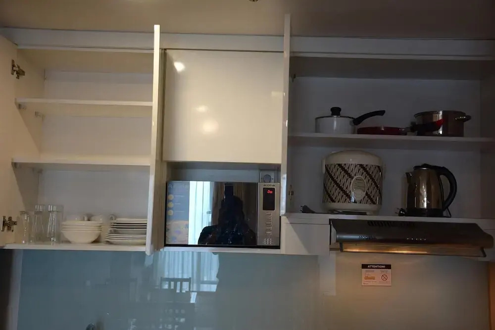 Homey And Cozy Stay 2Br At Casa Grande Apartment