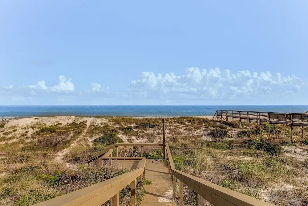 Roomy Chalet-Style Beachfront Condo with Private Beach Access by RedAwning