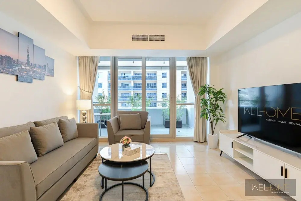 WelHome - Mesmerizing 1BR Apartment in Damac Waves A