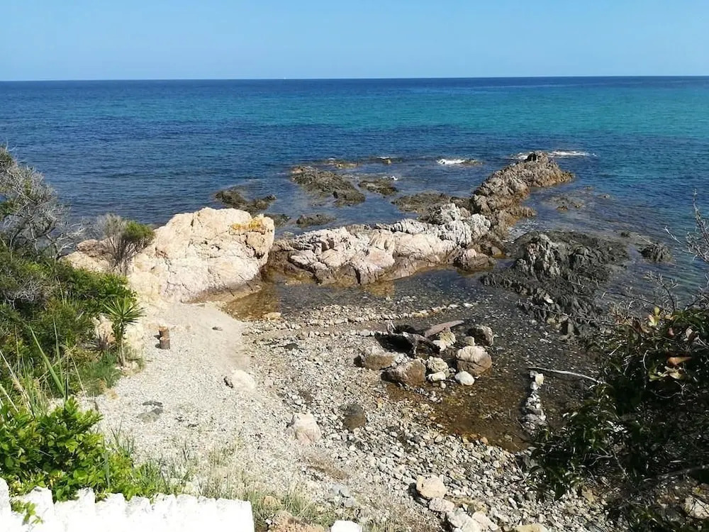 Terra Rossa- clim- pieds dans leau