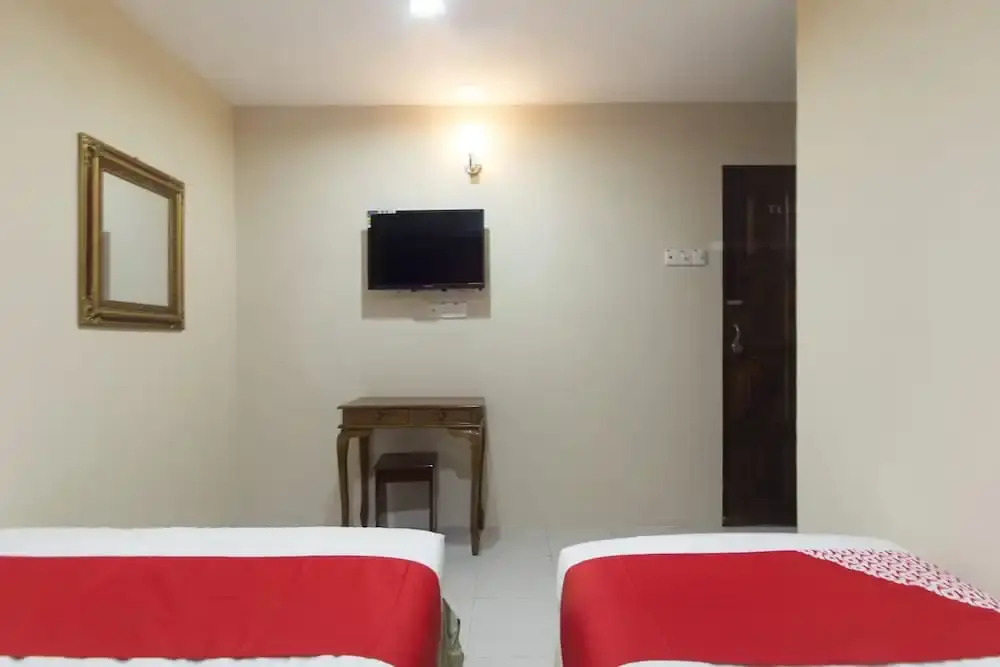 SPOT ON 89861 Man Hotel