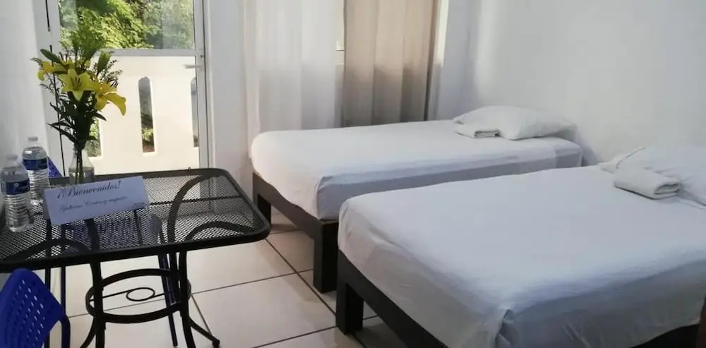Standard room with two single beds for relaxed stay