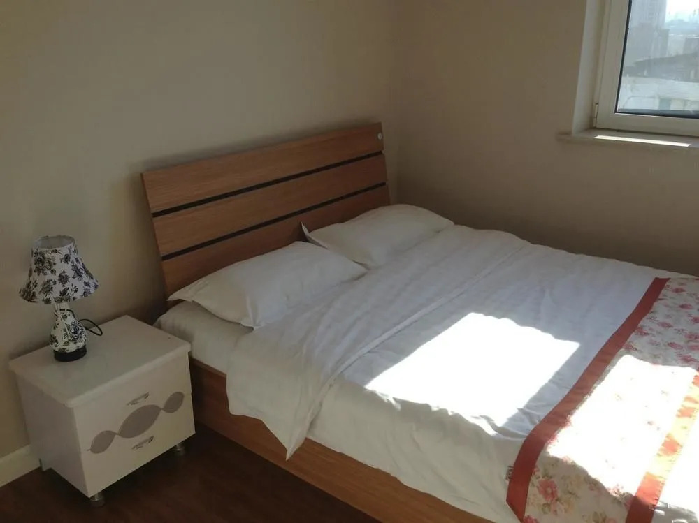 Dalian Yi Jia Express Apartment