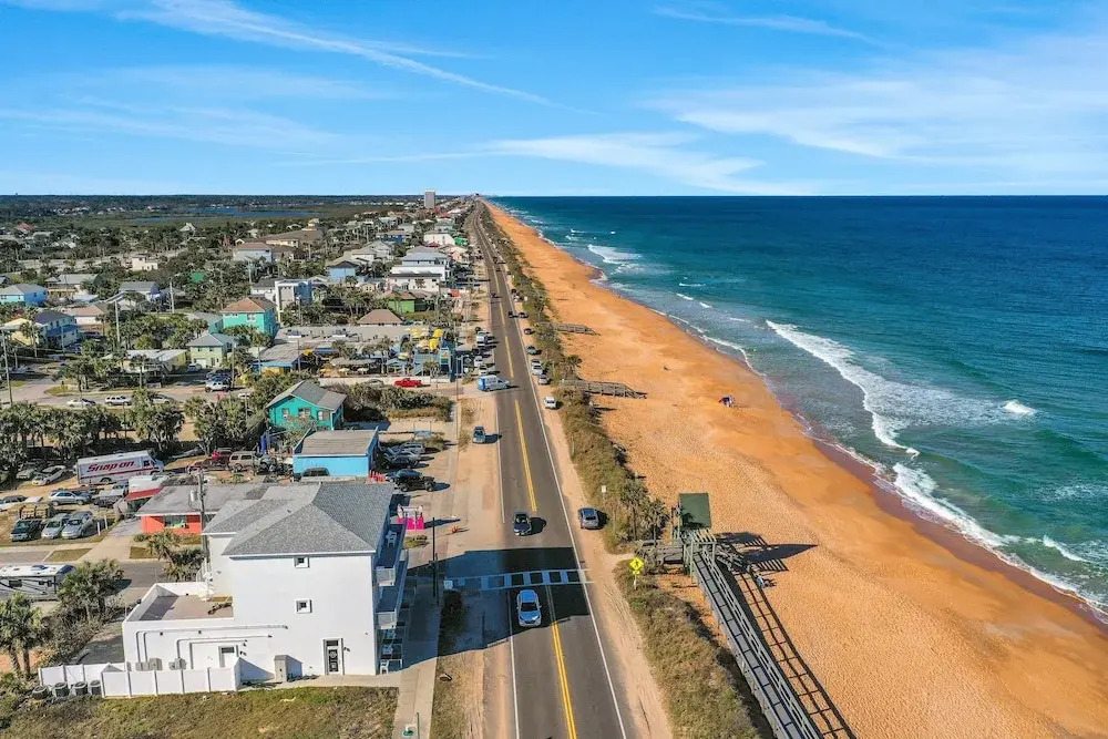 Updated Home Across From Beach With Covered Balcony, Central AC, & Washer/dryer