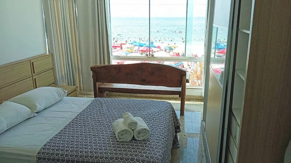 Triplex pé na areia
