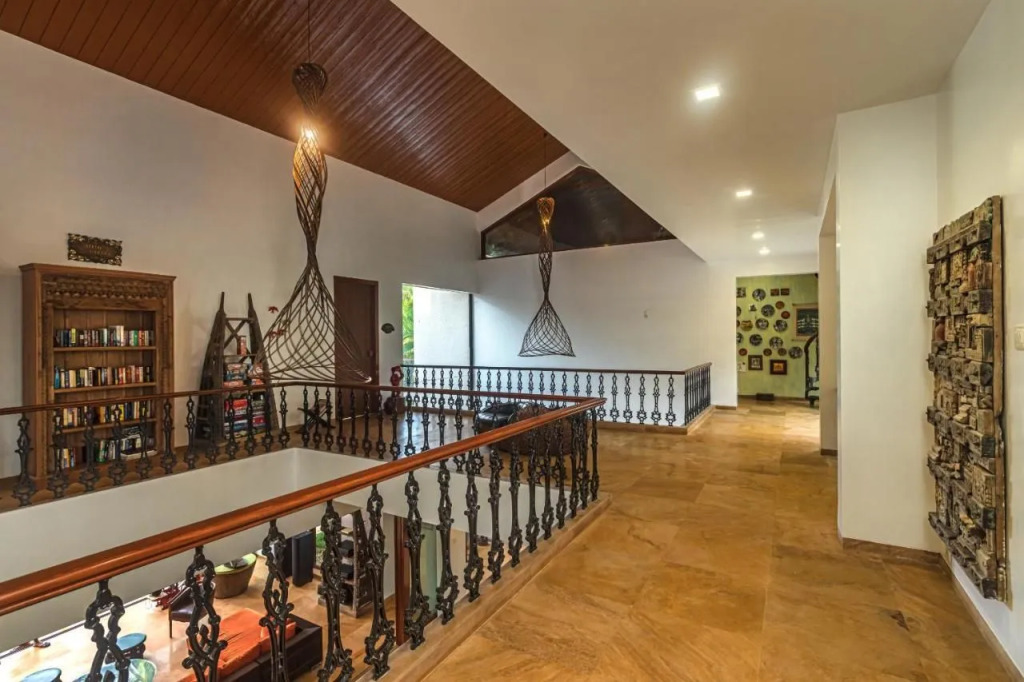 SaffronStays Casa Del Palms - 8BR luxury pool villa with gazebo, pickleball, bar & lawns near Nagaon Beach