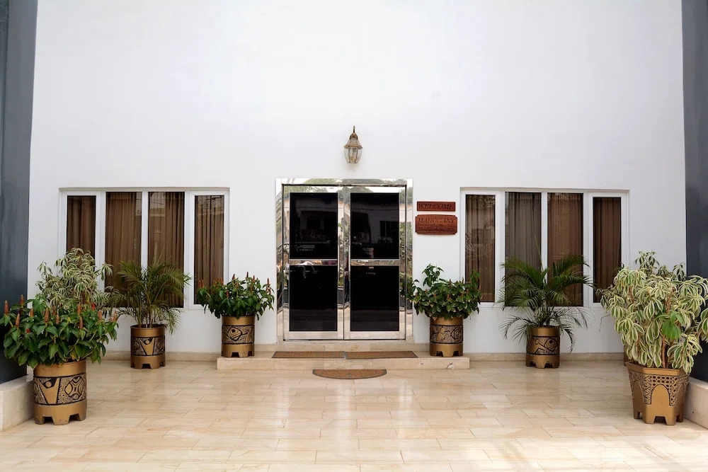 MAHOGANY HOTEL AND SUITES