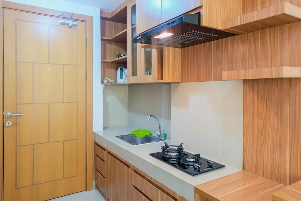 Brand New Compact Studio The Nest Puri Apartment By Travelio