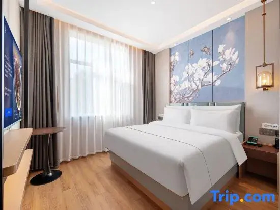 Magnotel Hotel (Taian Xintai Qingyun Shopping Center Jindou Road)