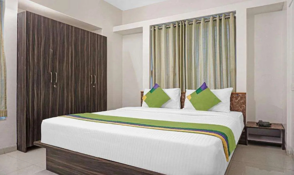 Treebo Diamond Residency - DDPK Inn