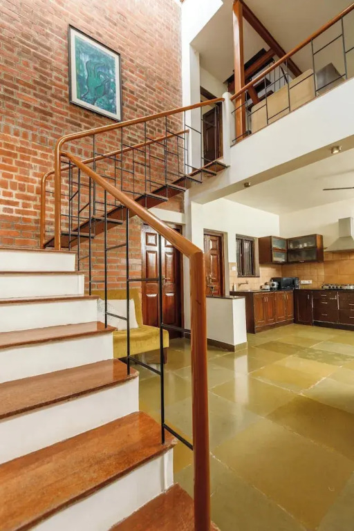 Kerala Style Villa by JadeCapsAC4BHKFishpond