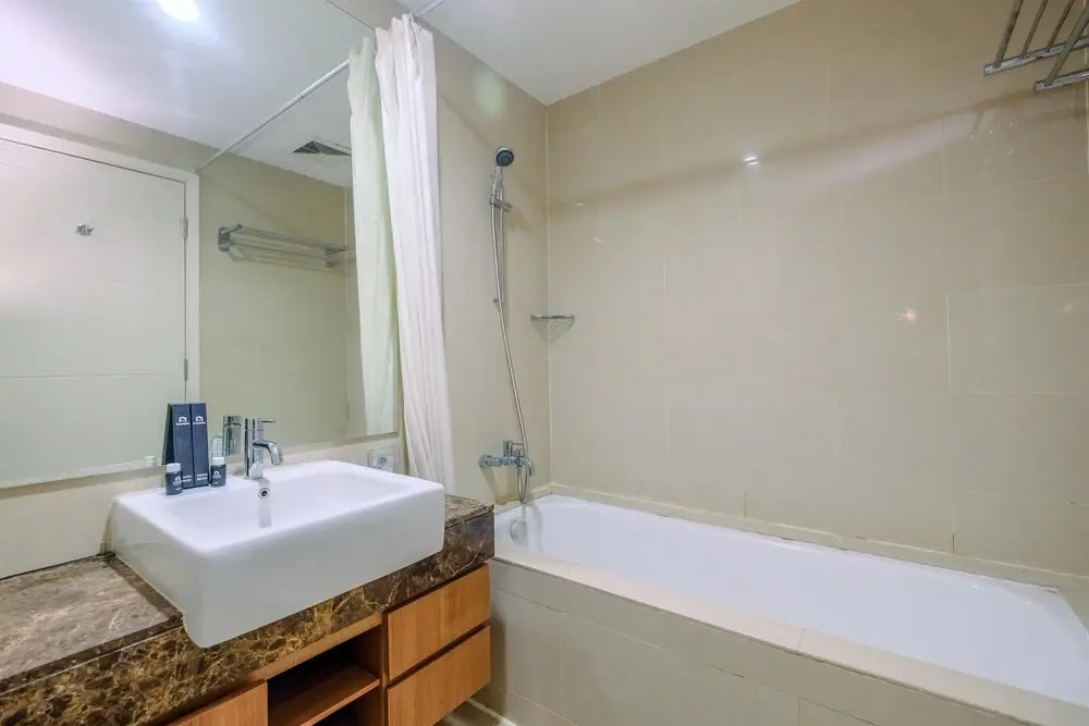 Best Location and Modern 2BR at Casa Grande Apartment