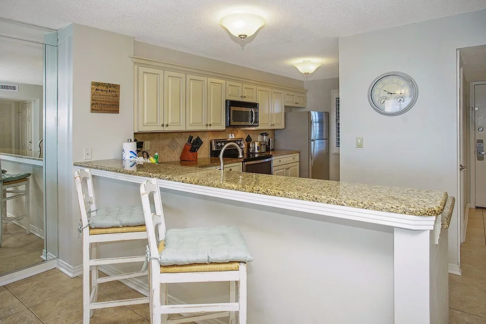 Hidden Dunes Condominium 1003 by Newman-Dailey
