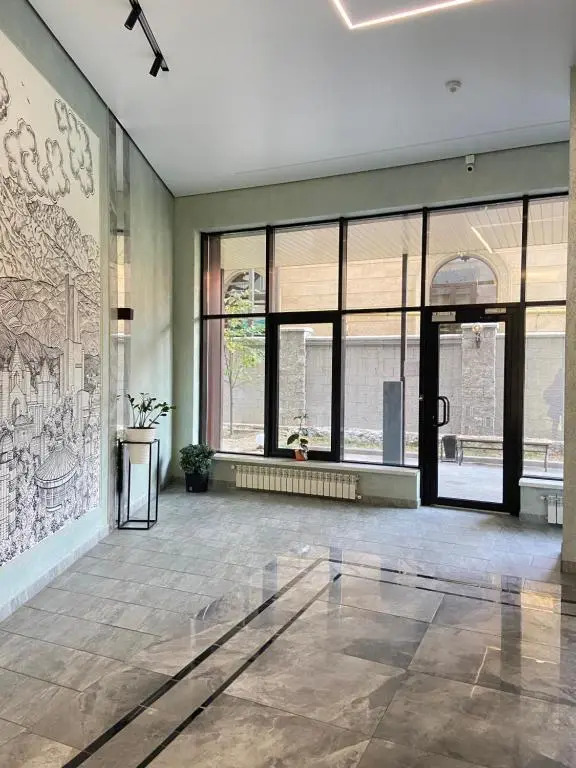 Modern Apartment in 10 min walk from Dostyk street