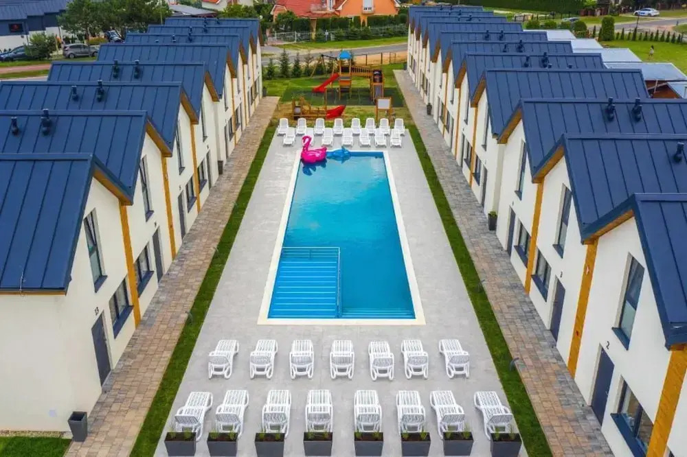 Comfortable holiday homes with a pool, Rewal