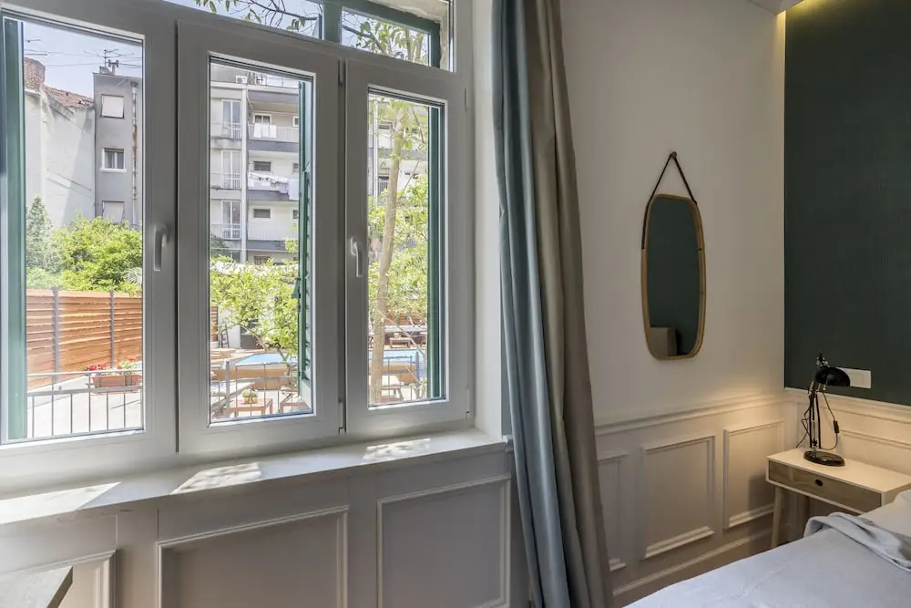 Evala luxury rooms with pool and garden