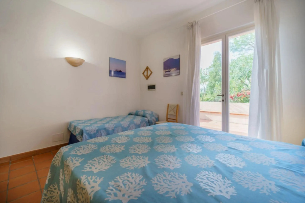 Baia Blu 1 in a small complex of colourful houses that directly overlooks the beach of Forno.-BAIA BLU N°1