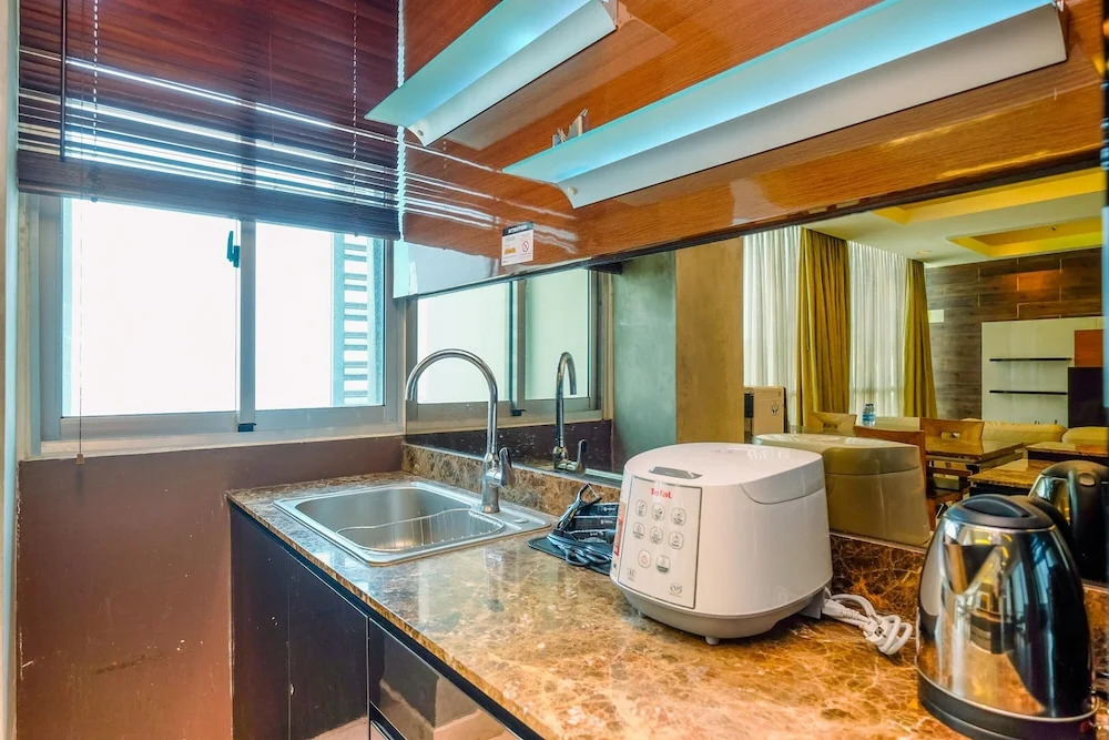 Homey Penthouse 3BR with Extra Room Kemang Village Apartment By Travelio
