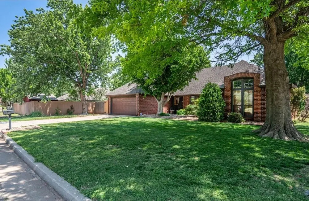 Spacious Retreat With Shaded Yard & Games 4 Bedroom Home by RedAwning