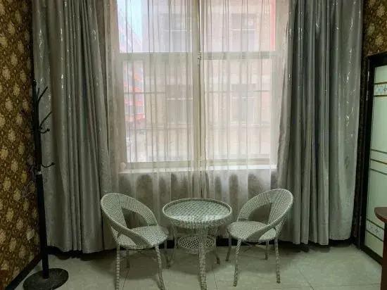 Qujing Ruixin Business Hotel