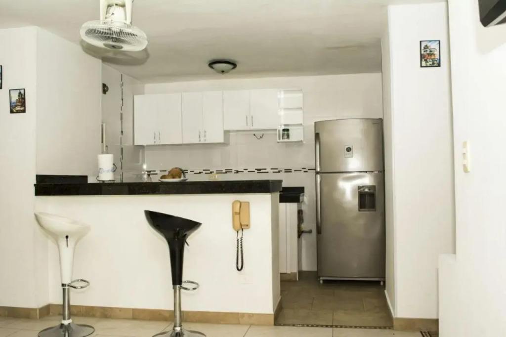 Apartamento con playa privada y piscina