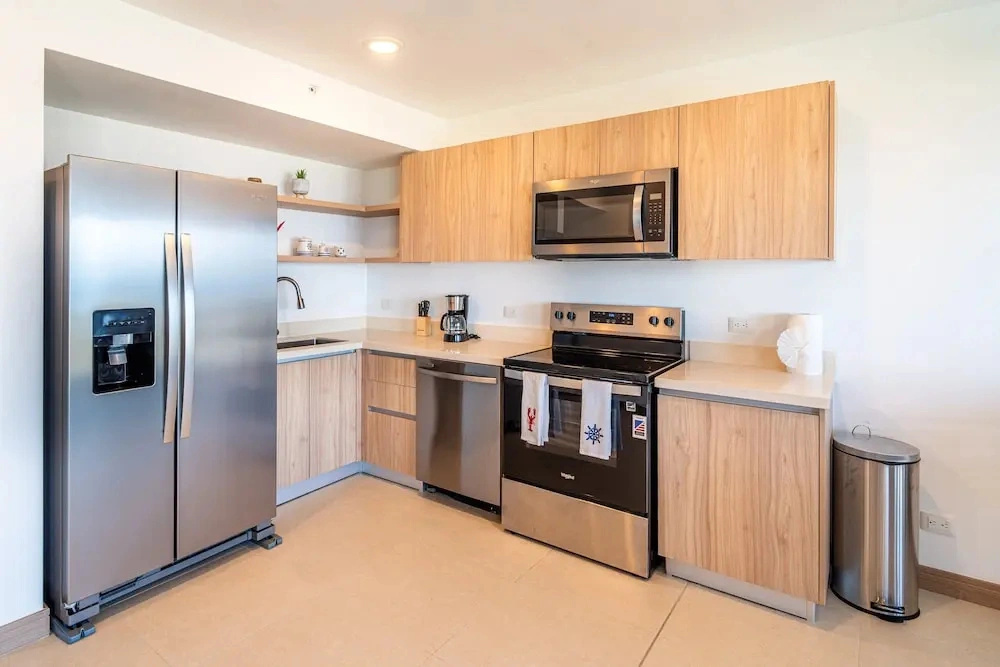 Ocean View Condo Steps to Beach & Comfort