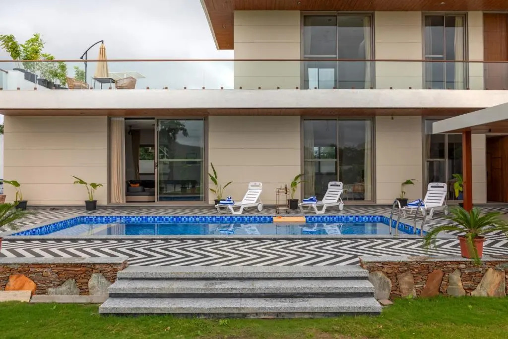 SaffronStays Raaga - luxury 4BR villa with private pool, lawns, gazebos & sweeping Aravalli hill vie