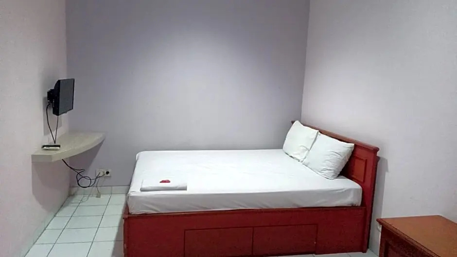 Super OYO 91104 Griya Mitra Residence