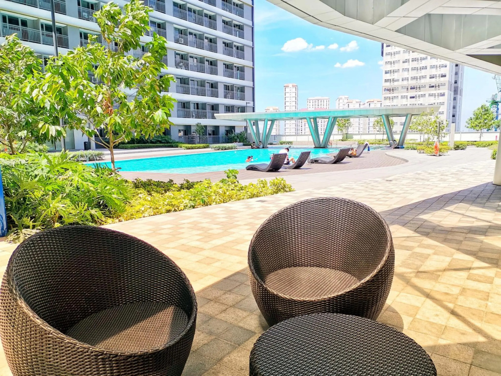 Stylish 1 Bedroom Condo Unit with Perfect Pool View Balcony at Fame Residences