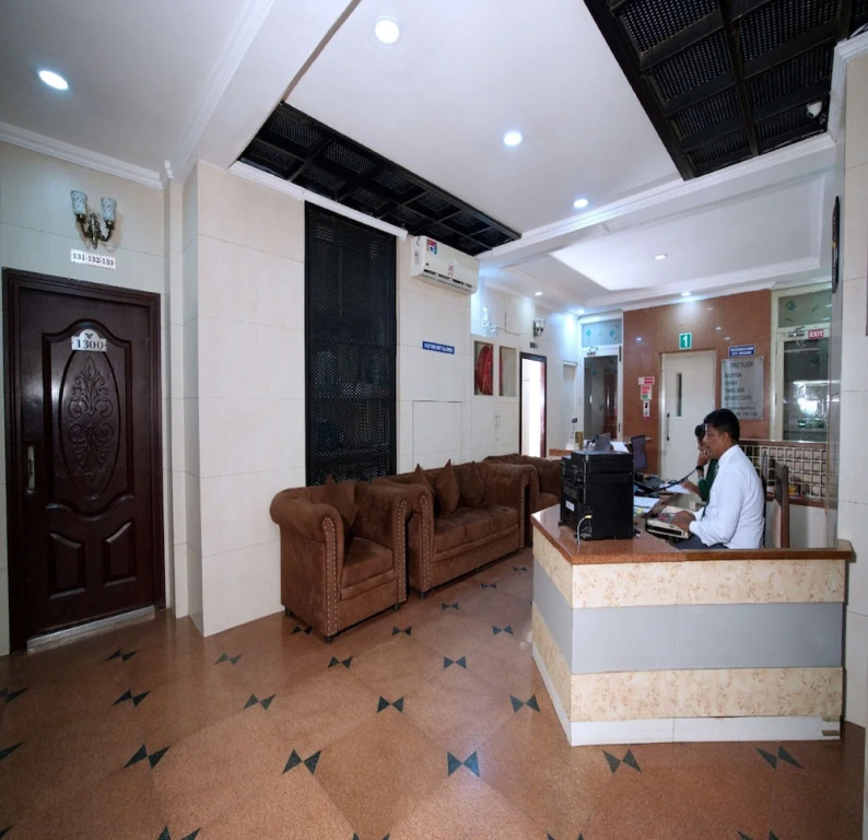 Blossoms Hotel & Service Apartments