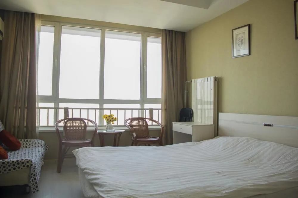 Qingdao Noah Tourist Apartment (CBD Wanda Plaza)