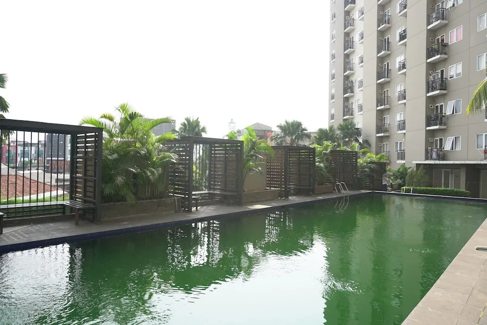 Warm and Cozy 1BR Puri Park View Apartment