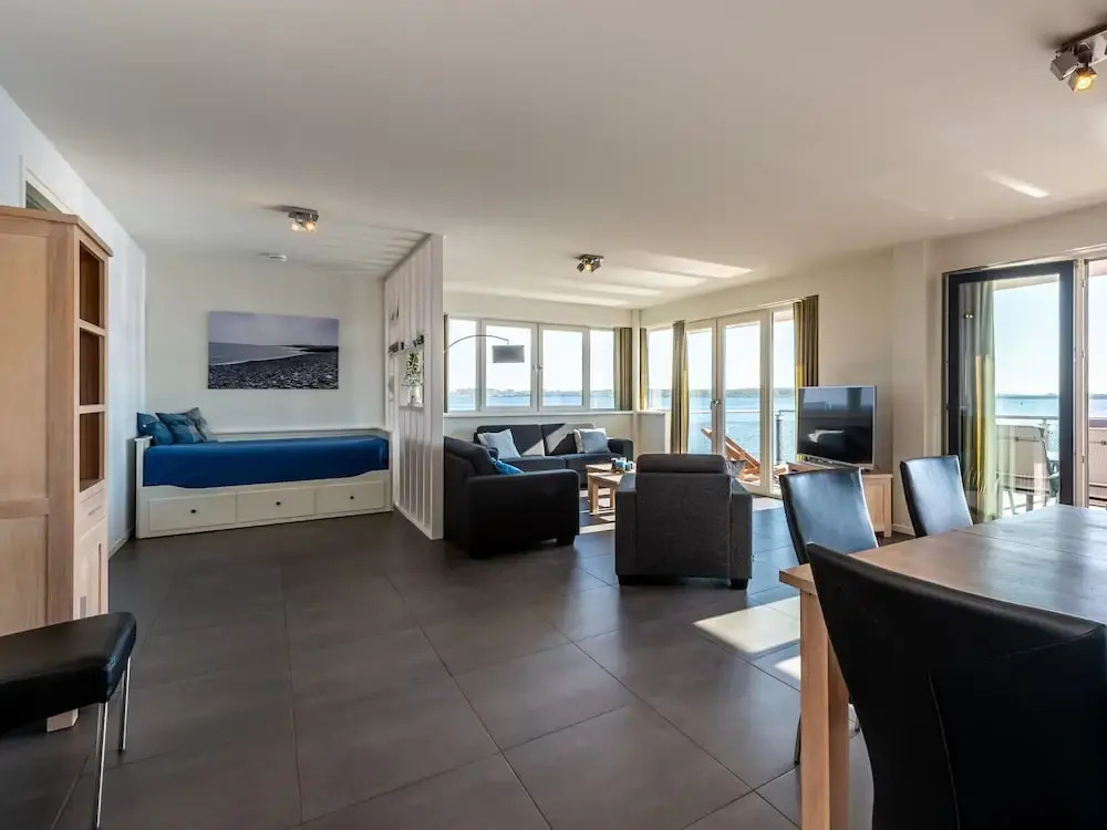 Waterfront penthouse with roof terrace and private jetty