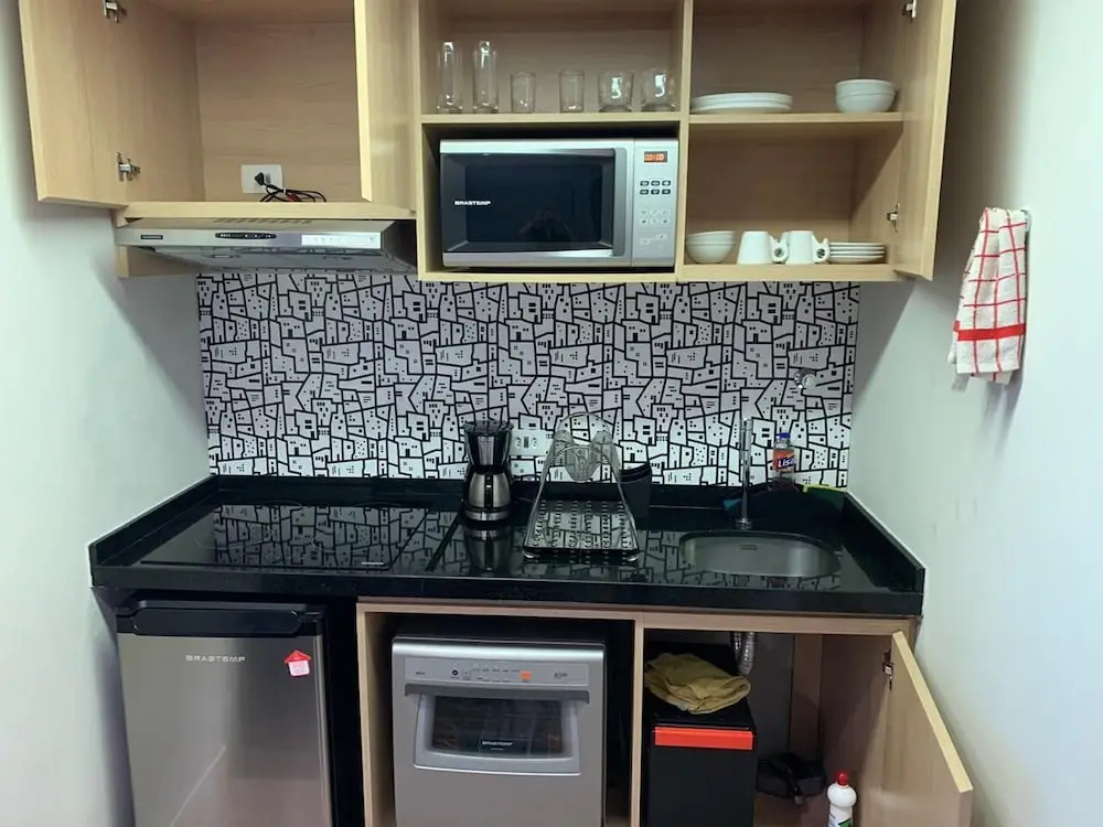 Quarto e Sala Particular em Aparthotel