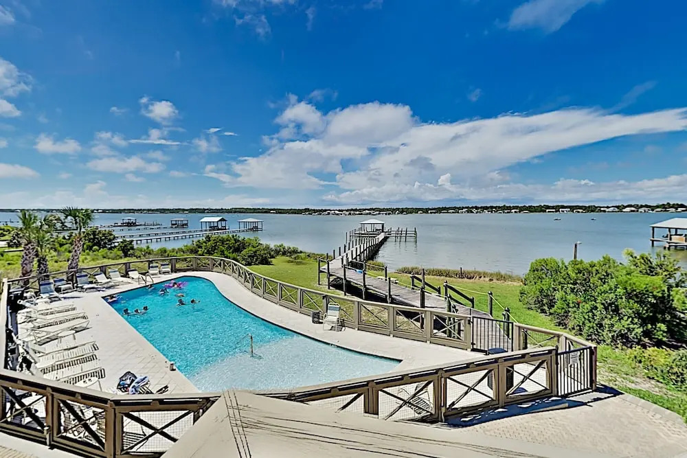 All-suite Laguna Paradise W/ Pool, Dock & Pier 2 Bedroom Townhouse