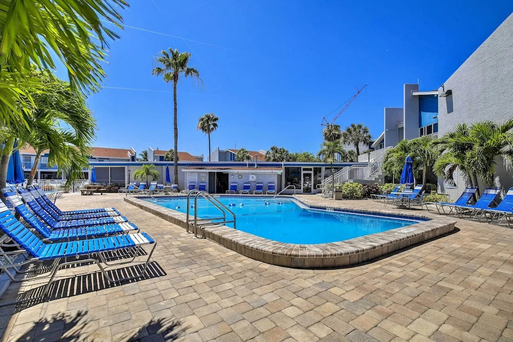 Sip, Sunbathe & Relax Poolside: Madeira Beach Gem!
