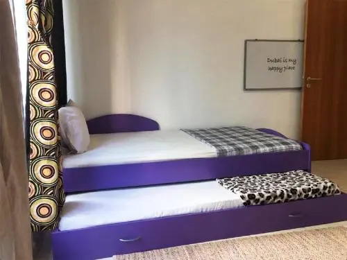 The Dubai Holiday Home, spacious 2 Bedroom Apartment, podium landscape view
