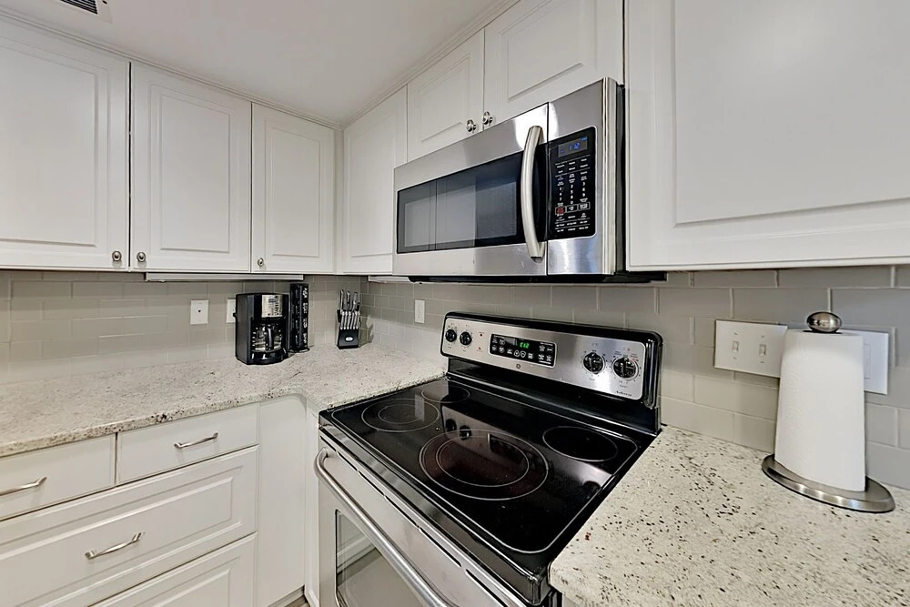 Upgraded In-town Gem: Private Patio & Parking 2 Bedroom Home