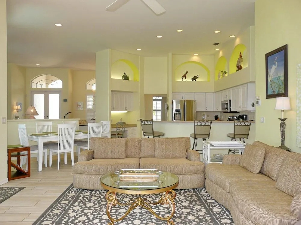 Waterfront home with views, pool and walk to beach