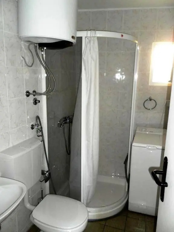 Sunny Port Apartment & Rooms