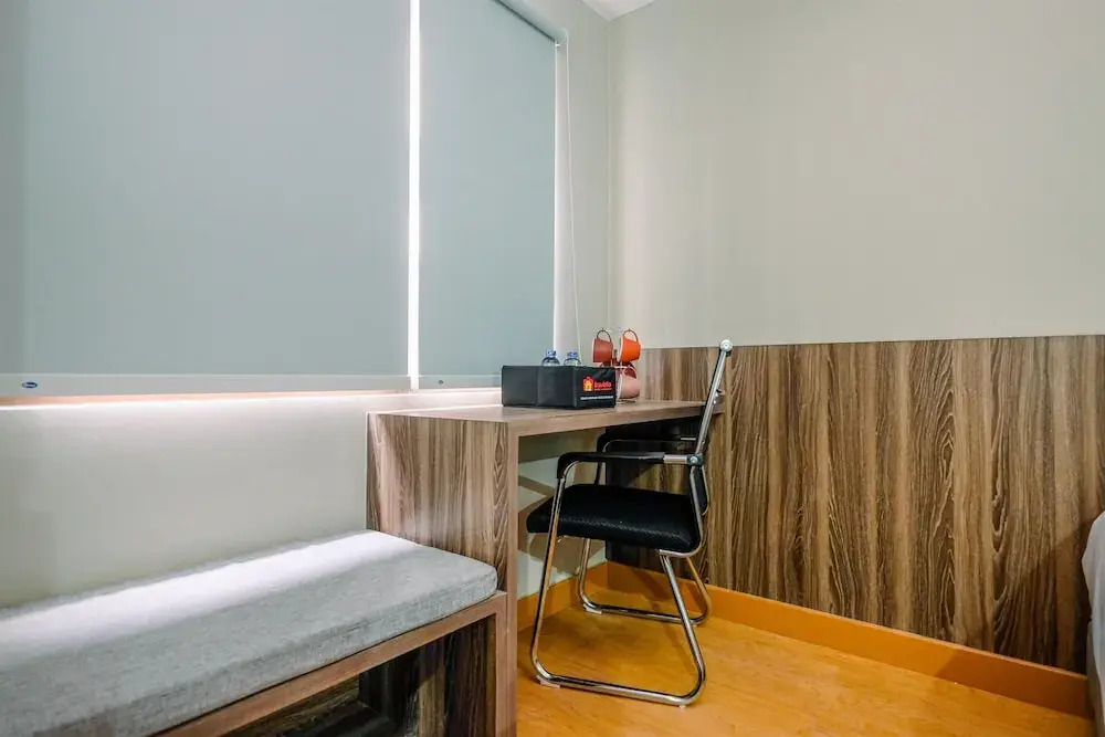 Comfortable Pool View Studio Room at Gateway Park LRT City Jatibening Apartment By Travelio