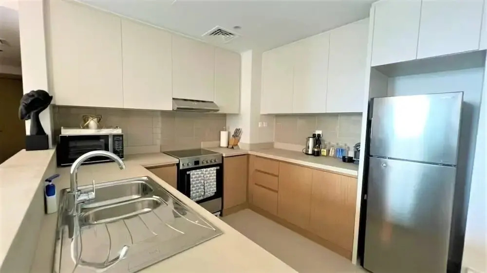 Elegant Luxury Apartment with Stunning Lake Views in Dubai Creek Harbour By ĀYA Boutique