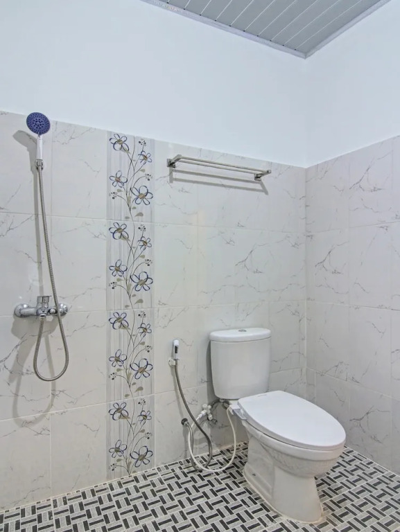 Capital O 90643 Suri Guest House Syariah